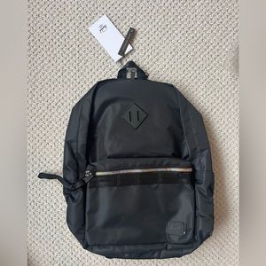 Herschel recycled black nylon backpack w/ rainbow zipper. New with tags in bag.